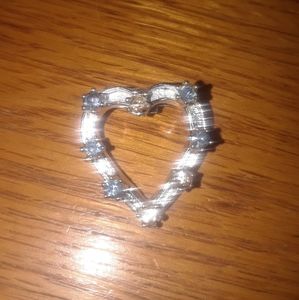 Heart shaped brooch with stones